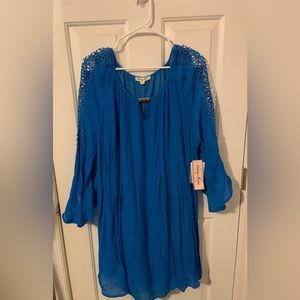 Beautiful Blue casual dress has never been worn  great for any occasion.